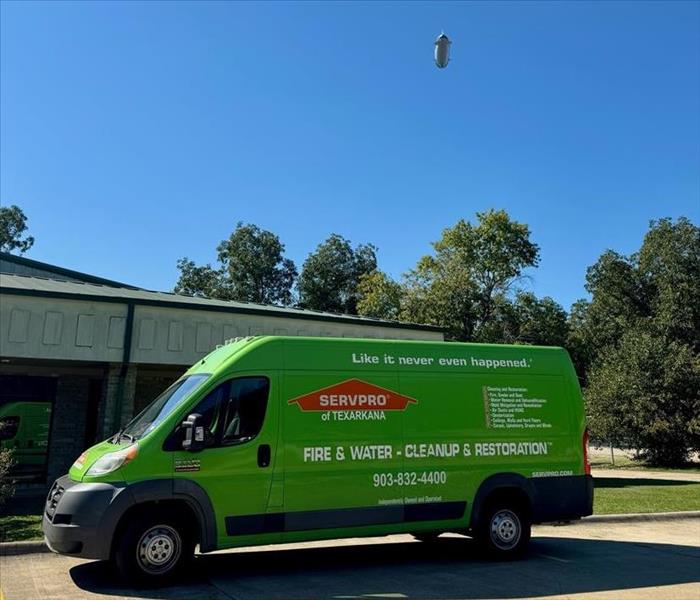 SERVPRO van with Goodyear Blimp