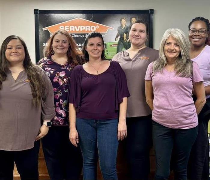 Office ladies in purple