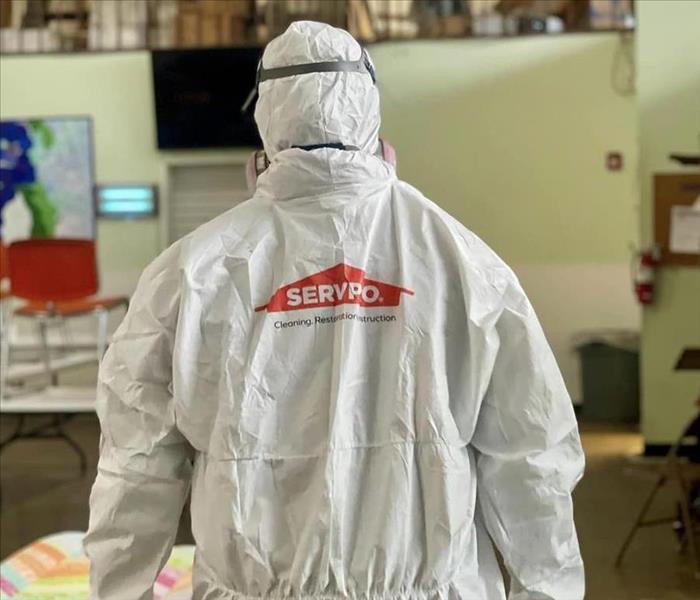 Employee wearing SERVPRO branded PPE