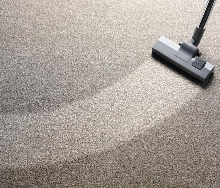 SERVPRO carpet cleaning machine cleaning carpet flooring